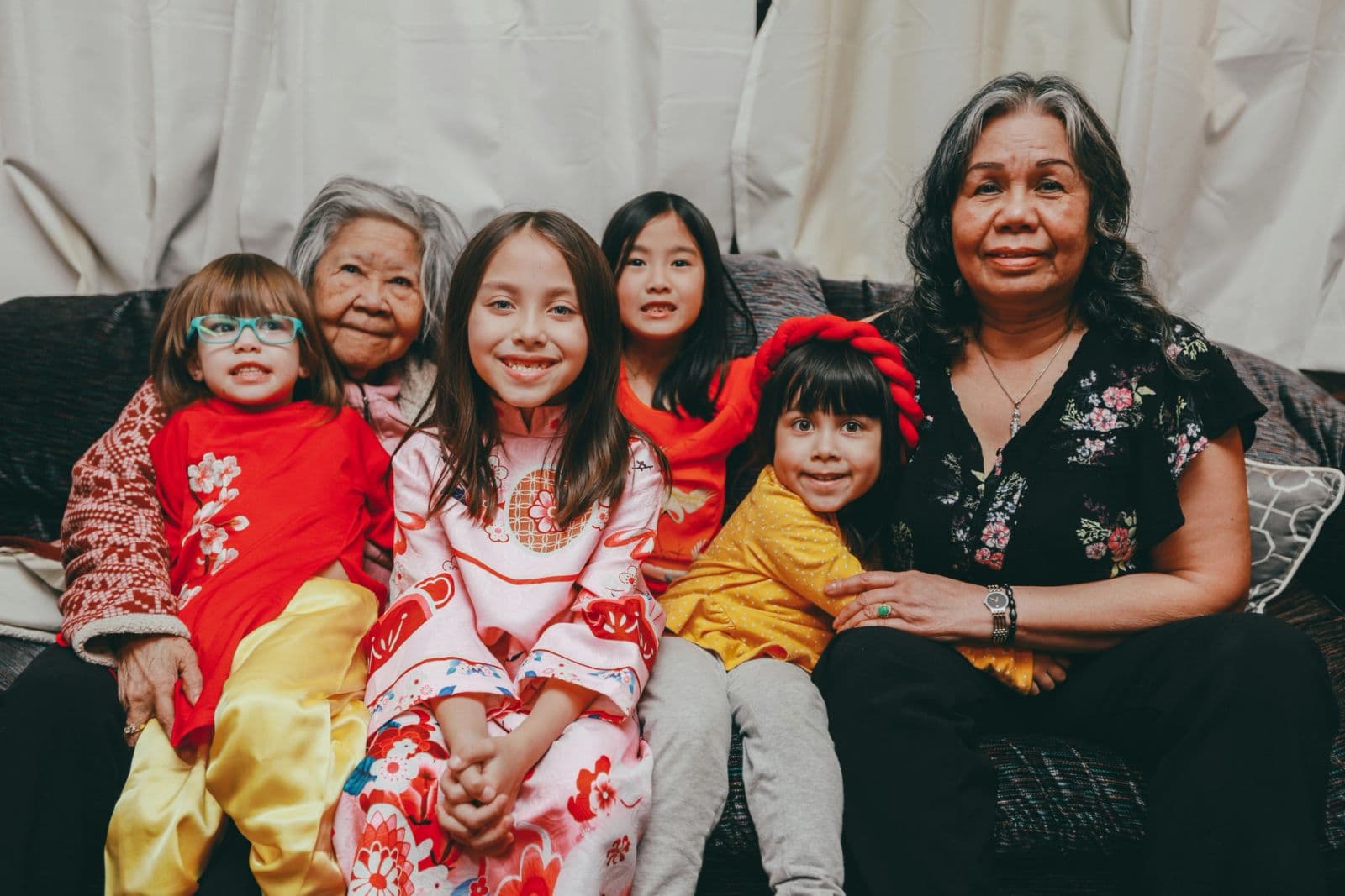 Family members of different generations sitting together